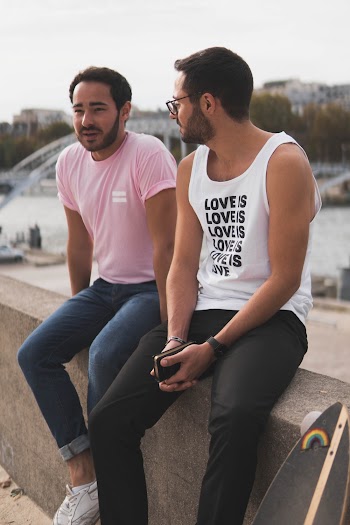 Two Men Sitting Down