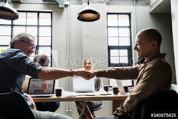 Two people giving a fist bump