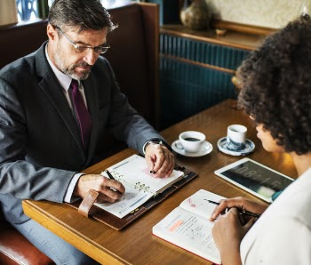 Two People in a Meeting