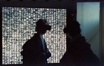 Two People in Dark Room