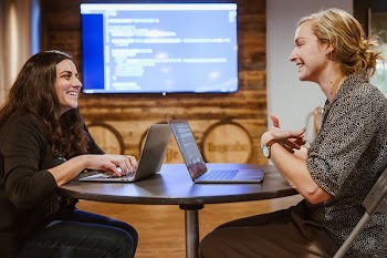 Two People Learning To Code