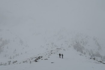two people on mountain covered with snow