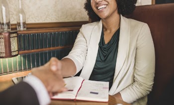 Two People Shaking Hands