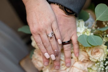 Two People Showing Rings