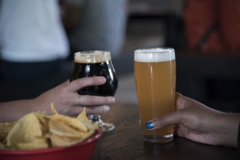Two People Toasting Glasses