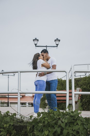 Two People Wearing Blue Jeans