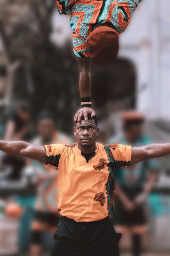 two person doing acrobat