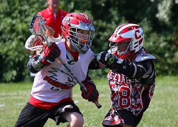 Two Person Playing Lacrose
