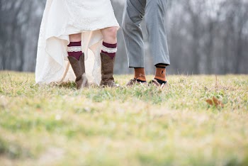 Two Person Standing on Grass Field