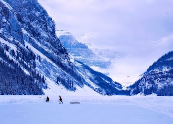 Two Person Walking on Snow