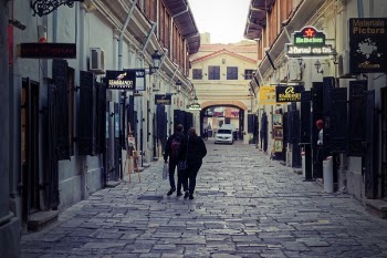 Two Person Walking on Street