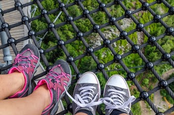 Two Person Wearing Gray Shoes