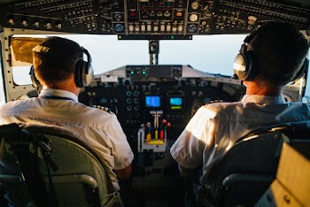 Two Pilots Flying an Airplane