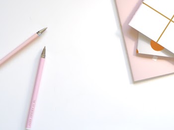 Two Pink Ballpoint Pens on Table