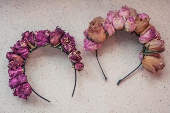 Two Pink Rose Flower-accent Headbands on White Surface