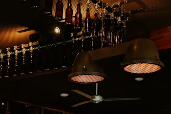 Two Round Black Metal Pendant Lamps