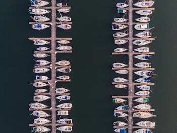 Two Rows Of Docked Boats