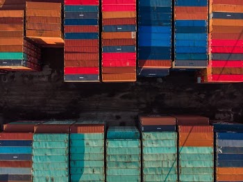 Two Rows Of Stacked Shipping Containers