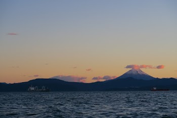Two Sea Vessels in Sea during Golden Hour