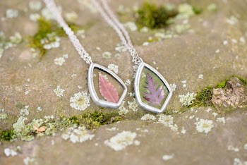 Two Silver-colored Pendant Necklaces