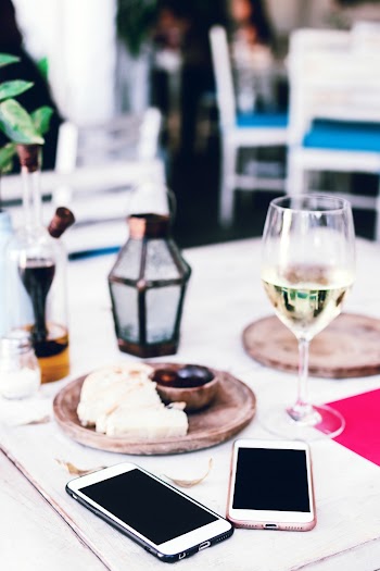 Two Smartphones on Table
