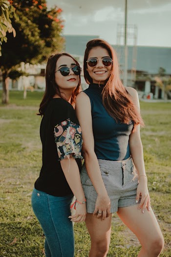 Two Smiling Women Posing for a Photo