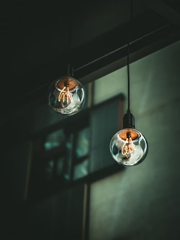 two switched on pendant lamps
