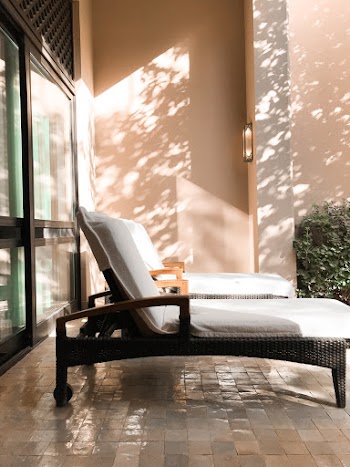 Two White-and-brown Lounge Chairs