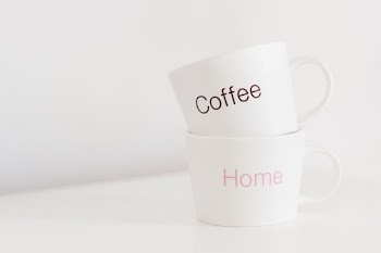 two white ceramic mugs
