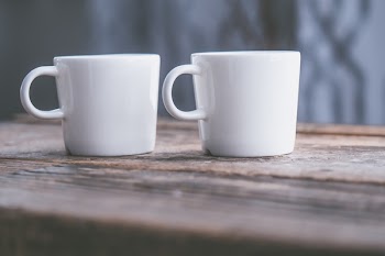Two White Ceramic Mugs Shallow Focus Photography