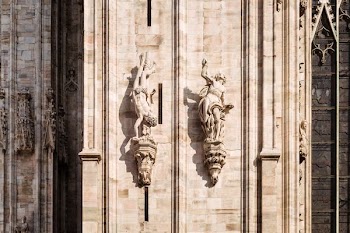 two white concrete sculptures wall decor