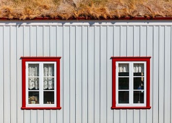 two white wooden window panels