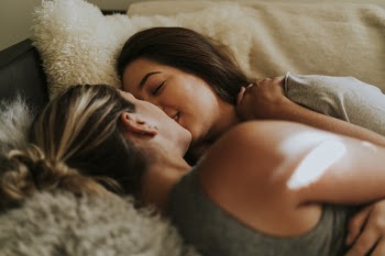 Two Woman Kissing Each Other