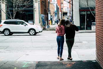 Two Woman Near Street Under Sky