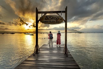 Two Woman Standing on Pier