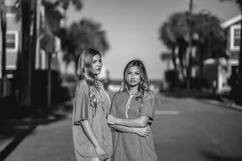 Two Woman Standing on the Road in Grayscale Photography