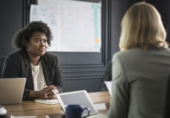 Two Woman Talking to Each Other