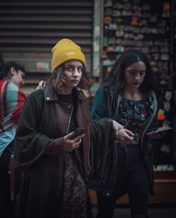 Two Woman Walking on Focus Photography