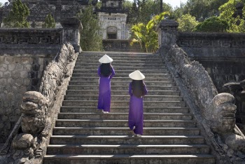 Two Women Climbing on Stairs