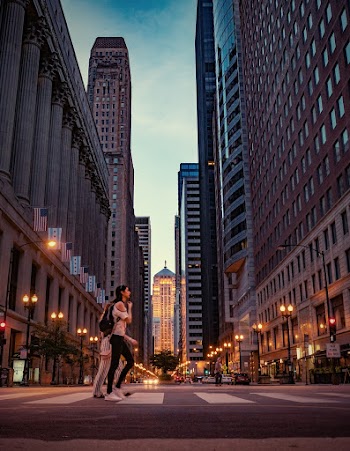 Two Women Crossing Pedestrian Lane