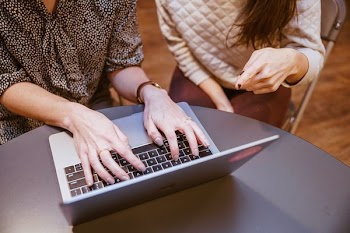 Two Women On Laptop