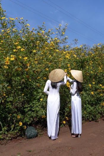Two Women Picking Flowers