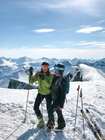 Two Women Skiing on Snow