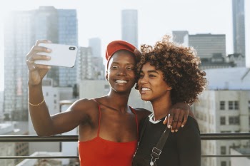 Two Women Taking Photo