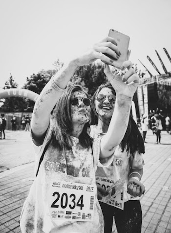 Two Women Taking Picture