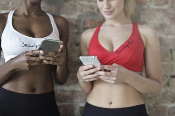 Two Women Uses Smartphones