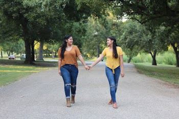 Two Women Walking on Pathway