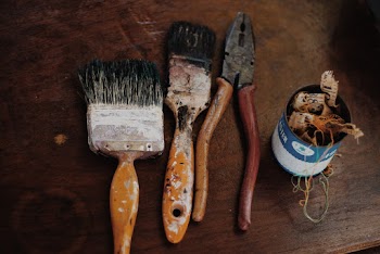 Two Yellow Brushes and Red Pliers