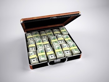 U.s. Dollar Bill on Brown Steel Case