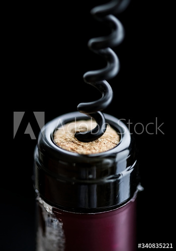 Uncorking a bottle of red wine